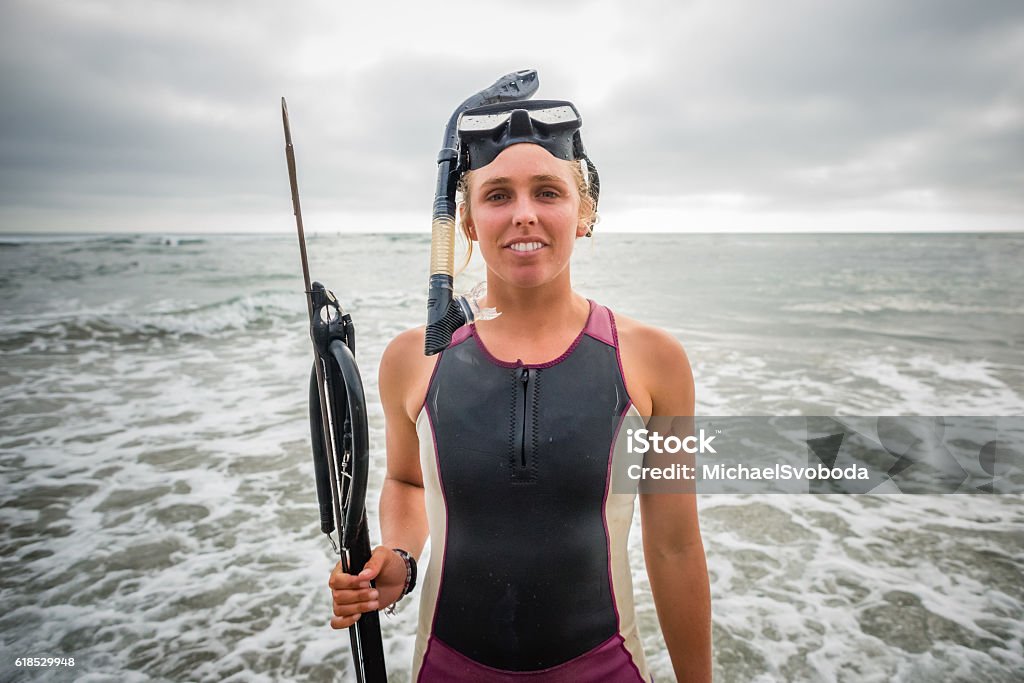 Spearfishing Women Standing In The Ocean Stock Photo - Download