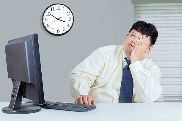 istock Pensive overweight businessman in the office 618530070