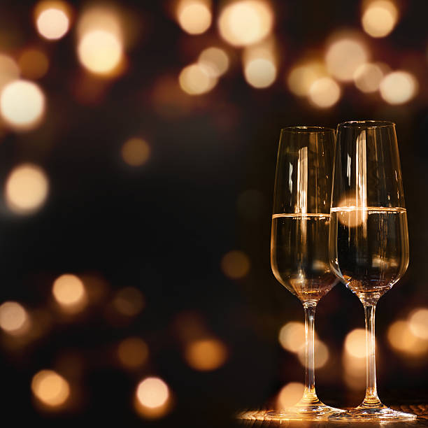 two champagne glasses for festive occasions - textraum imagens e fotografias de stock