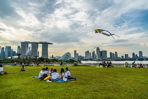 Singapore - 1 October 2016: People enjoying their weekend with different activities at the rooftop of Marina barrage