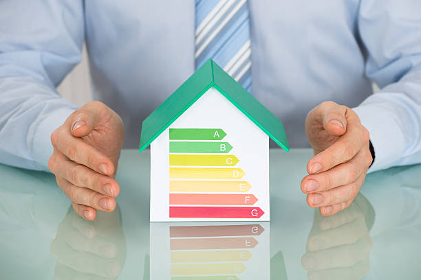 istock Businessperson Protecting House Model 618531710