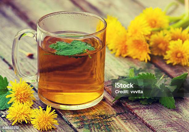 The Cup Of Melissa Herbal Tea On A Wooden Table Stock Photo - Download Image Now - Alternative Therapy, Condiment, Cup