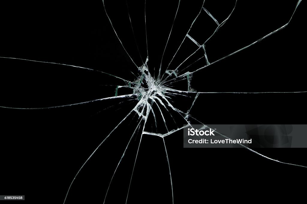 Broken glass on black background Glass - Material Stock Photo