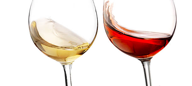 istock red and white wine with splash, cheers close up  isolated 618536814