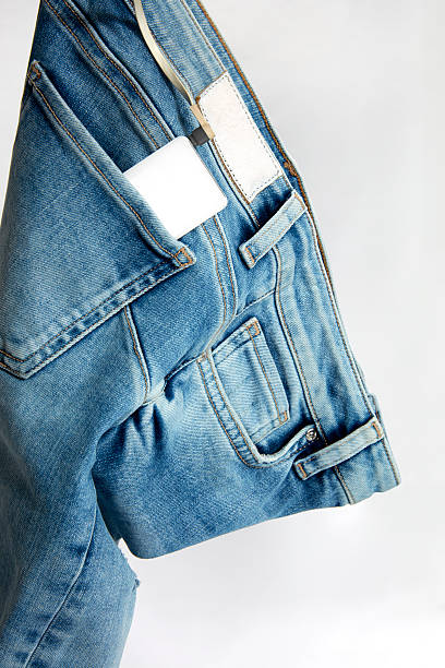 istock Player in the pocket of blue jeans 618536866