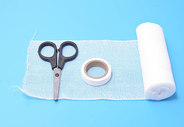 istock Medical bandage scissors and plaster 618538230