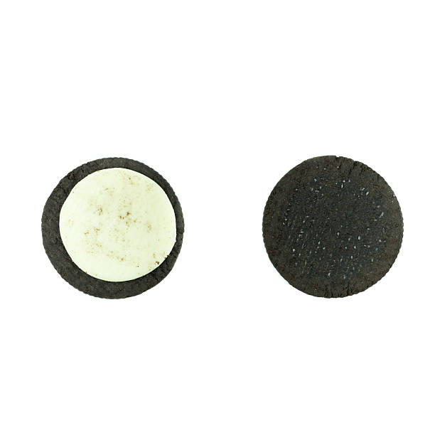 istock Chocolate cookies with creme filing isolated on white 618538366