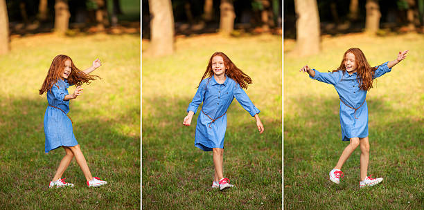 istock Silly little red-haired girl 618539350