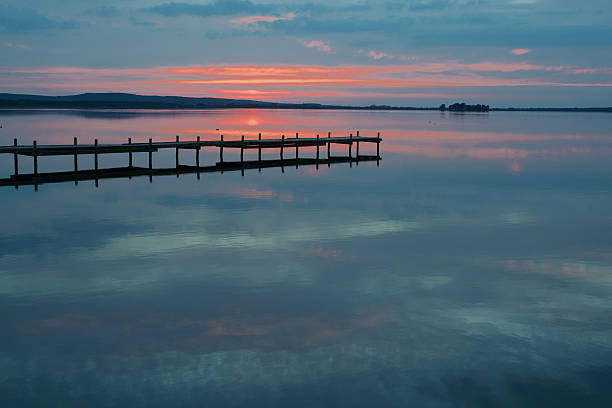 istock Sunset scenics over lake with jetty 618539668