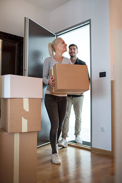istock Couple entering the new flat 618540070