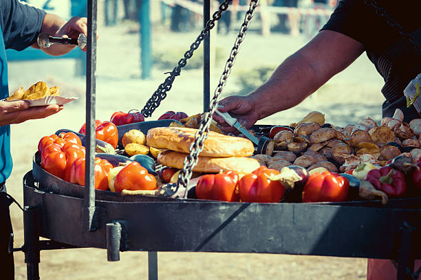 Man cooking on barbecue for family dinner