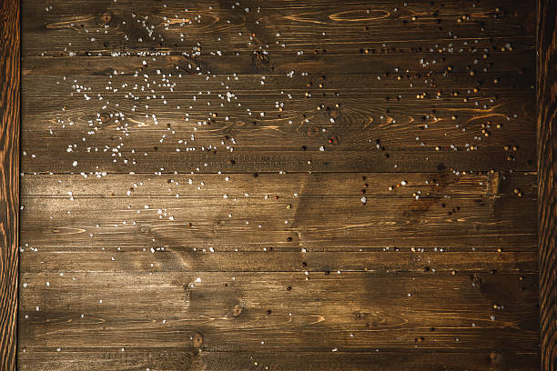 istock salt and pepper on a wooden Board 618545868