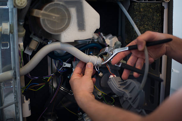 istock Man tries to repair the leak 618545978