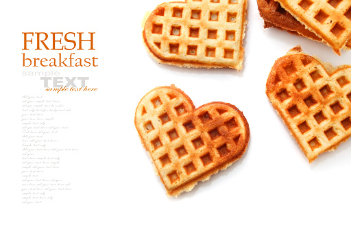 Heart shaped waffles isolated on white background