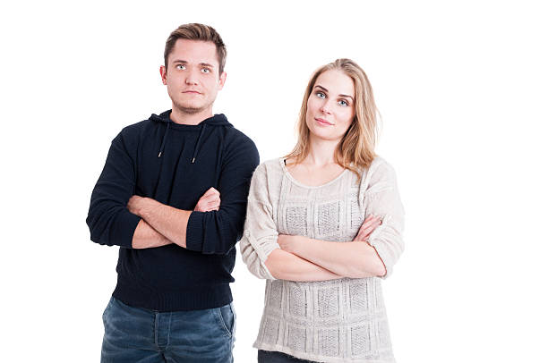istock Couple posing and standing with arms crossed 618548692