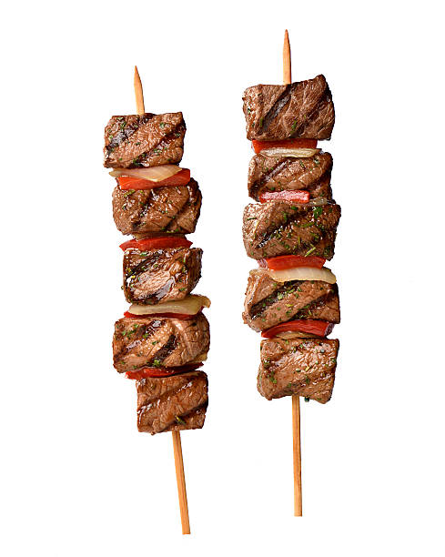 meat skewer on white background meat skewer on white background skewer photos stock pictures, royalty-free photos & images