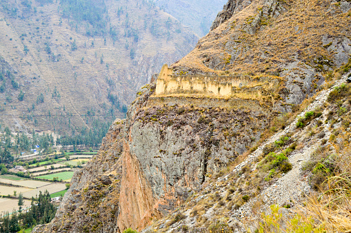 Ollantaytambo is a village in the Sacred Valley of south Peru, set on the Urubamba River amid snow-capped mountains. It's known for the Ollantaytambo ruins, a massive Inca fortress with large stone terraces on a hillside. Major sites within the complex include the huge Sun Temple and the Princess Baths fountain. The village's old town is an Inca-era grid of cobblestoned streets and adobe buildings.