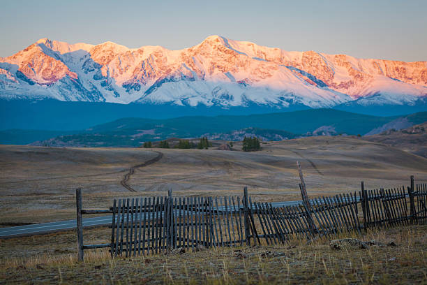 istock Wooden fence in snow covered mountains 618554624