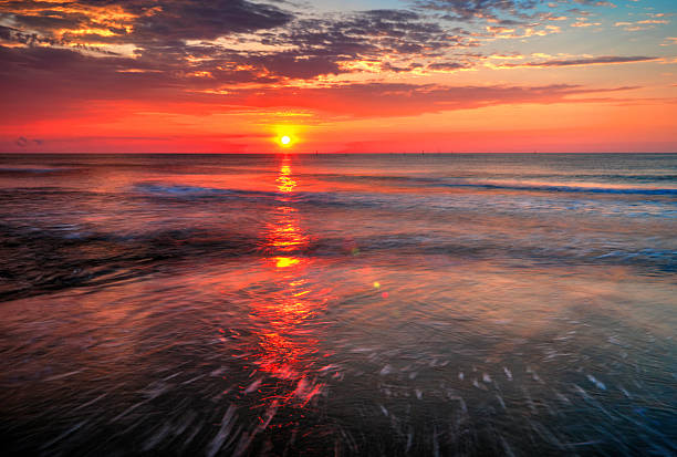 istock Beautiful sunrise over the sea 618554714