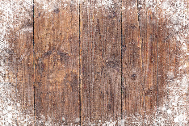 fondo de navidad con copos de nieve y las tablas de madera - construction frame plant nature wall fotografías e imágenes de stock