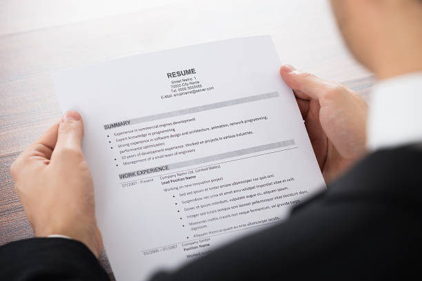 istock Businessman Holding Resume 618608600