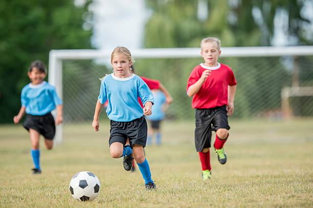 istock Kicking the Ball Down the Field 618608730