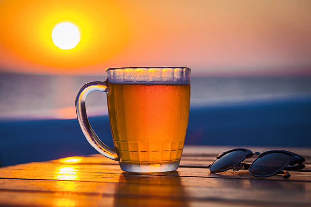 istock Beer with bokeh in the sea 618612092