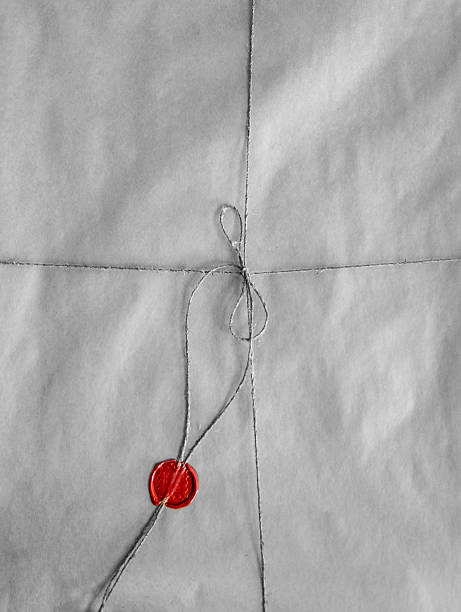 istock old envelope packed with twine and red seal wax 618612994
