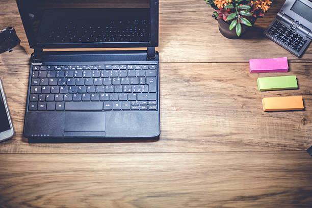 istock Laptop and smartphone with financial documen 618616144
