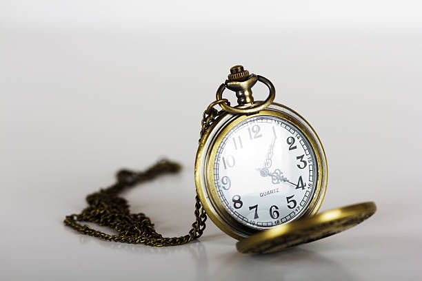 istock Pocket watch against a light background 618616534
