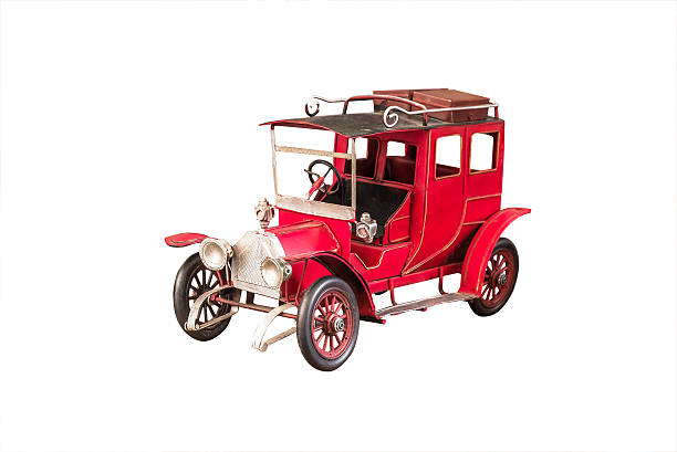 istock Toy vintage car red color isolated on white background.