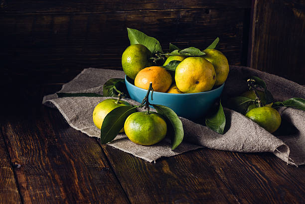 istock Yellow-green Tangerines Still Life 618617294