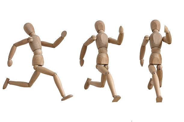 istock wooden mannequin running gesture 618618850