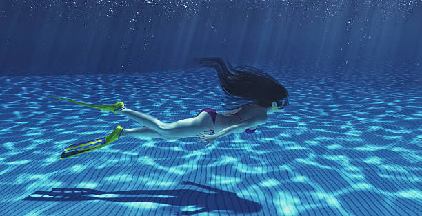 istock Girl swimming underwater 618620740