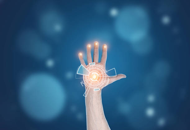istock Hand holding hologram of digital circuitry 618623302