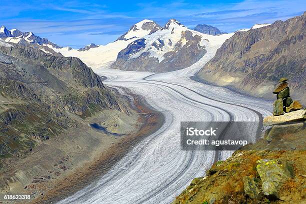 Inukshuk Aletsch Glacier Jungfrau Mönch Above Bernese Swiss Alps Stock Photo - Download Image Now