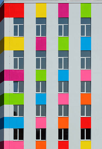 istock Regular pattern of windows in new residential building 618623382