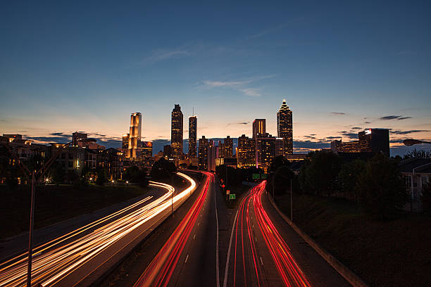 istock Light streaks through the Atlanta highways at blue hour 618625762