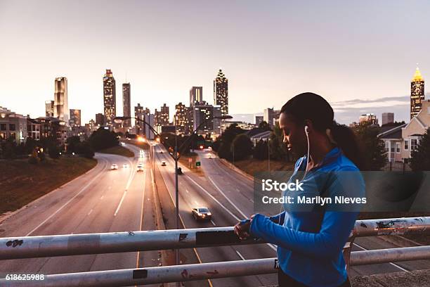 Woman Preparing For A Run In The City Stock Photo - Download Image Now - Atlanta - Georgia, Running, One Woman Only