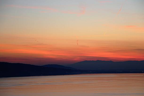 istock switzerland - sunset on leman lake 618626484