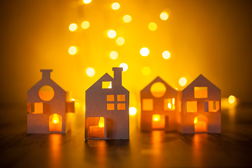Paper houses and bokeh background