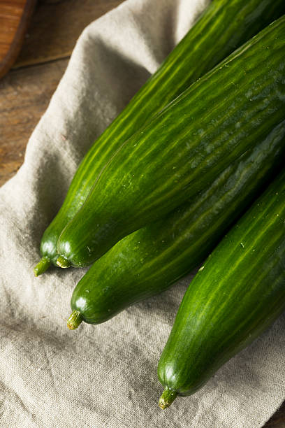 istock Raw Green Organic European Cucumbers 618629968
