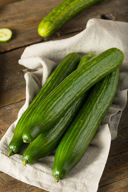 istock Raw Green Organic European Cucumbers 618630026