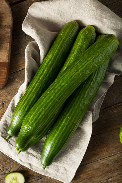 istock Raw Green Organic European Cucumbers 618630136