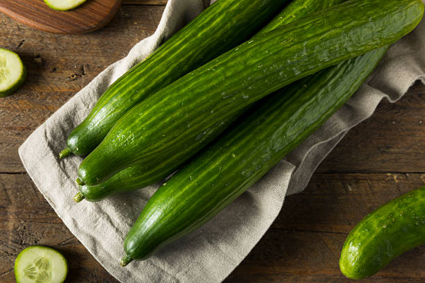 istock Raw Green Organic European Cucumbers 618630158