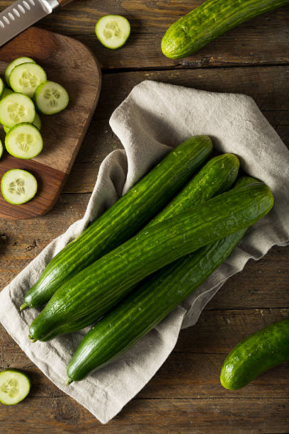 istock Raw Green Organic European Cucumbers 618630184