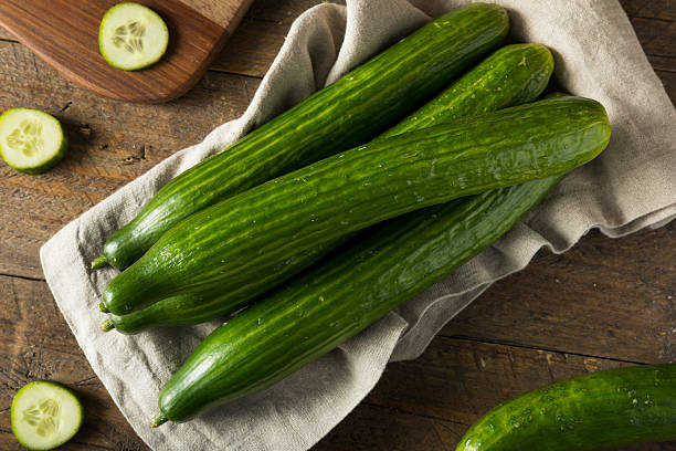 istock Raw Green Organic European Cucumbers 618630210