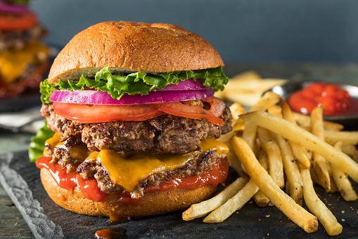 Homemade Cheese Smash Burger with Lettuce Tomato and Fries