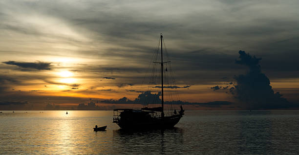 istock boats in twilight scene 618633956