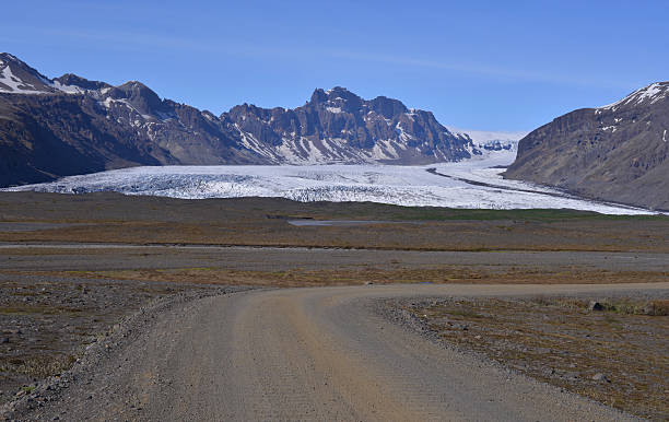 istock Road to glacier, Iceland 618634432